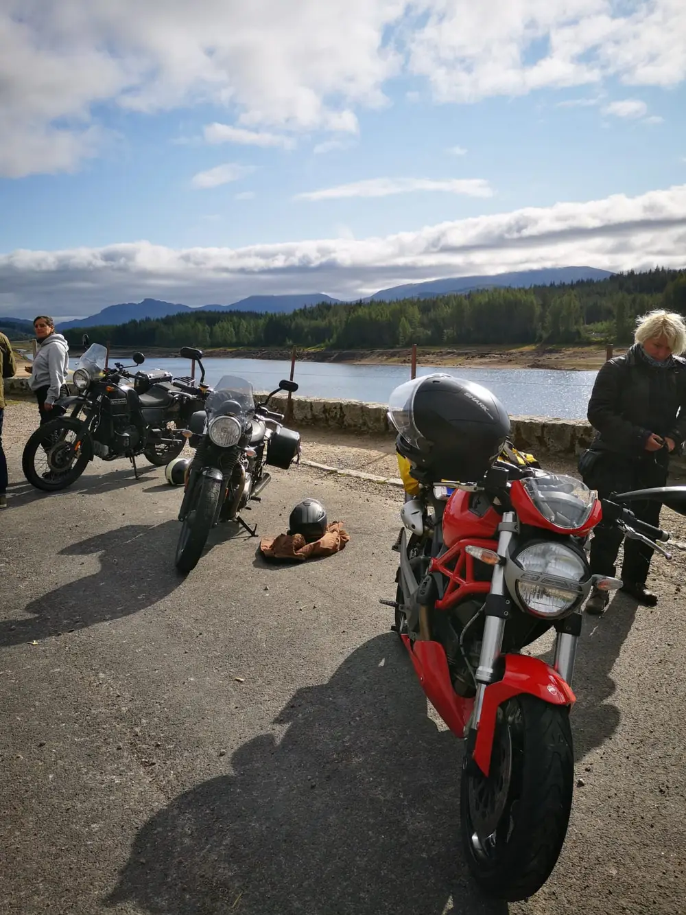 Motorcycles parked at a scenic stop on a ride out